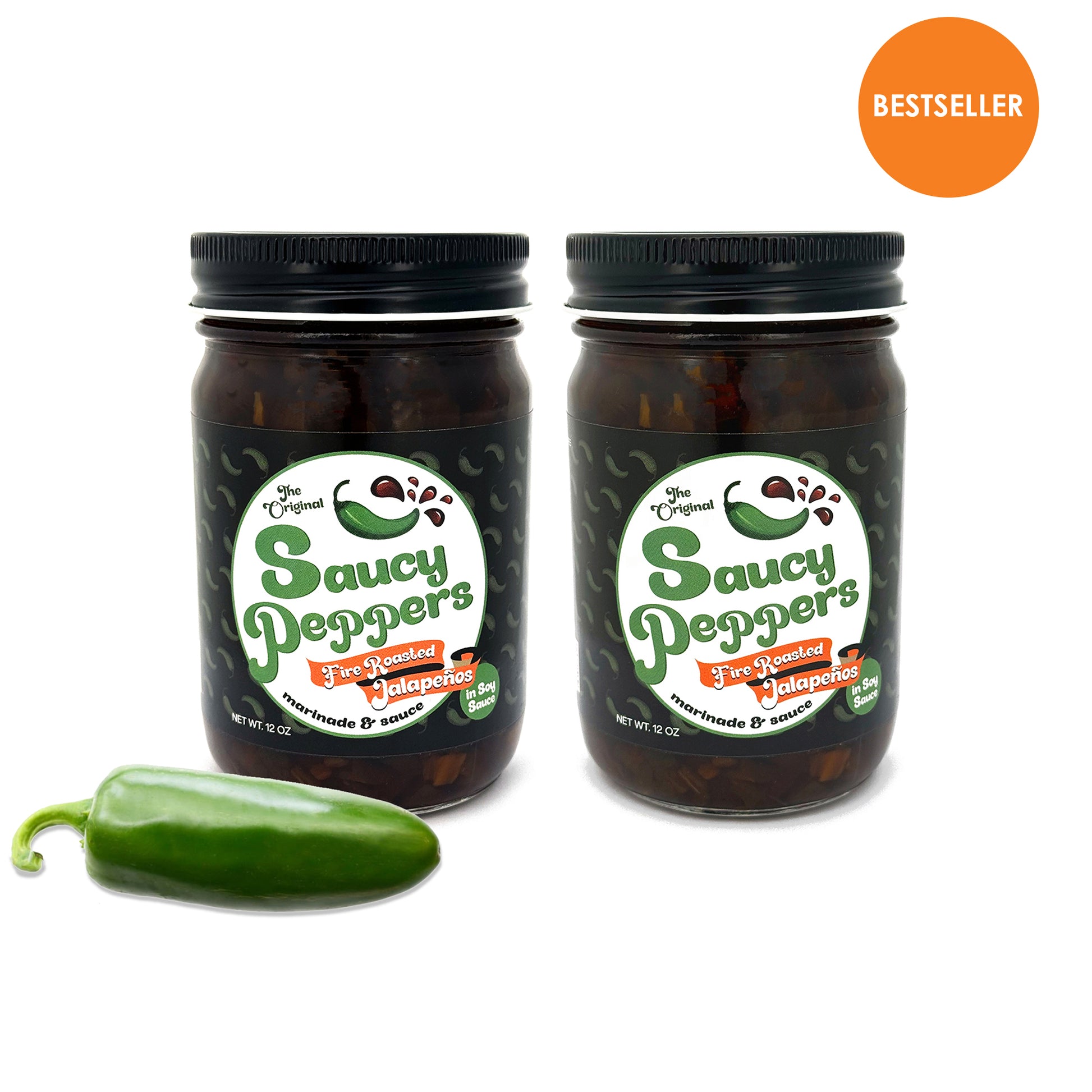 Two jars of 'Saucy Peppers' jalapeno soy sauce with a jalapeno pepper on a white background.